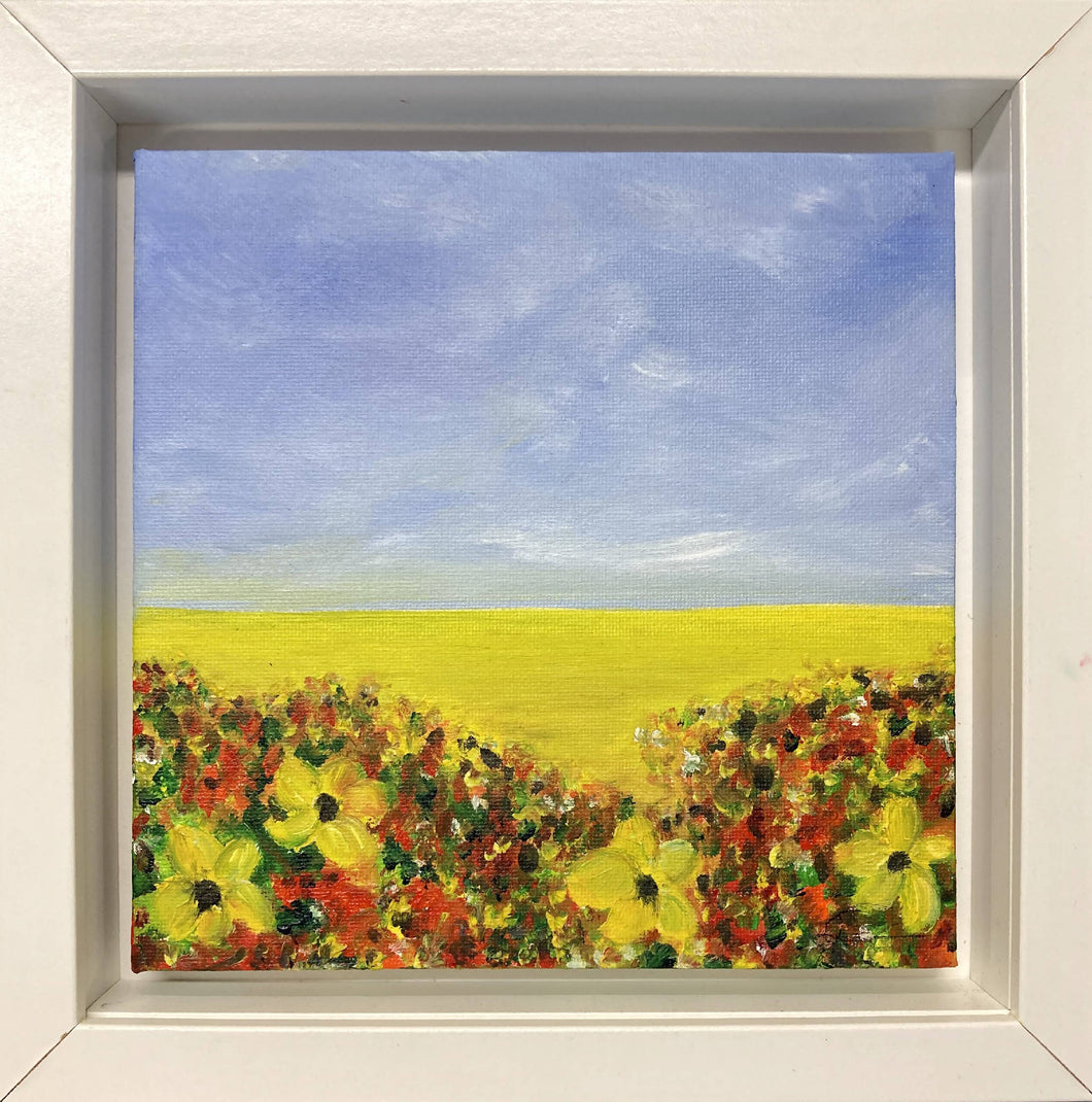 yellow field with flowers